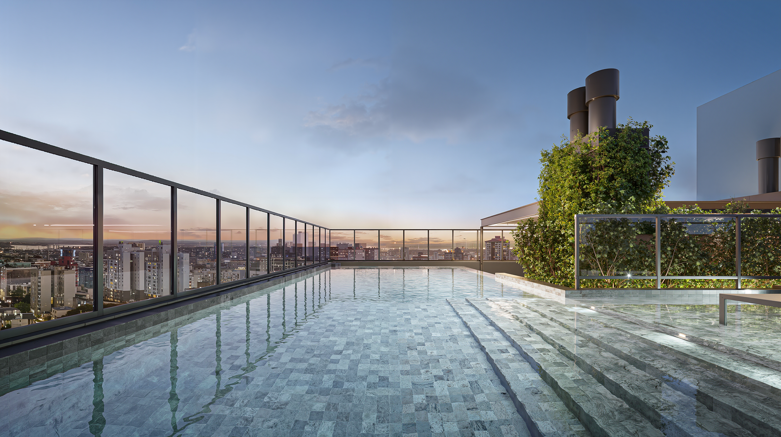 Piscina com borda infinita e vista panorâmica para o mar, deque molhado com espreguiçadeiras e bar molhado integrado ao solário